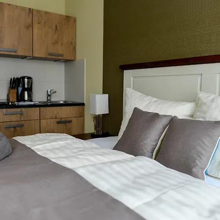 - Aparthotel